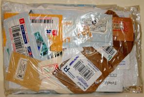 40 dkg kivágás: ragjegyek, díjjegyek, gépi bélyegek, stb.