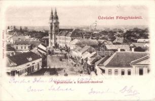 Kiskunfélegyháza, Félegyháza; Városrészlet a Kossuth utcával, templom. Vesszősi József kiadása (vágott / cut)