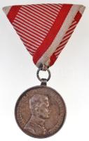 1917. "Károly Ezüst Vitézségi Érem II. osztálya" jelzett Ag kitüntetés mellszalagon. Szign.: Kautsch T:2- ph., patina Hungary 1917. "Silver Gallantry Medal, 2nd Class" hallmarked Ag decoration with modern ribbon. Sign.: Kautsch C:VF edge error, patina  NMK: 306.