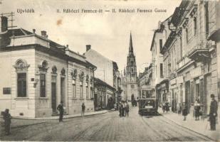 Újvidék, Novi Sad; II. Rákóczi Ferenc út, 21-es számú villamos az Artézi fürdő felé, üzletek / street view, tram, shops (EK)