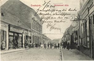 Érsekújvár, Nové Zámky; Komáromi utca, Attila Cipőgyár rt., Adler József kiadása / street view with shops