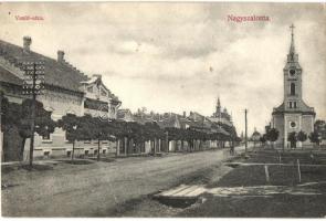 Nagyszalonta, Salonta; Vasút utca, Takarékpénztár, templom. Döme Károly kiadása / street, savings bank, church