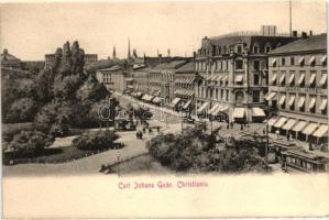 Oslo, Christiania. Carl Johans Gade / street view, hotel, trams, shops (EK)
