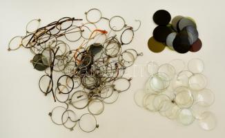 Nagy optikus tétel, összesen kb. 66 db: monoklik, cvikkerek, szemüvegek és keretek, lencsék, színezett üvegek