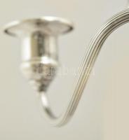 Dekoratív ezüst (Ag.)  háromágú gyertyatartó, súlyozott, jelzett, horpadásokkal, m:12,5 cm, bruttó:3...