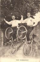The Dorkings. Men balancing on bicycles (EK)