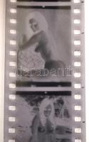 cca 1970-1980 14 db pornó felvétel negatívja (24x36 mm), tekercsben, fém tokban