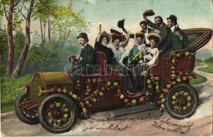 Automobile decorated with flowers, cheerful people with champagne (fl)