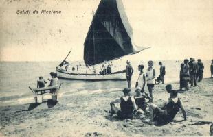 Riccione, beach view with sailing ship, sunbathing people (EK)