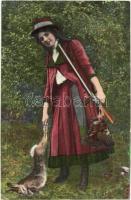 Hunter lady with hunted rabbit