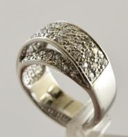 Ezüst(Ag) modern apró kövekkel kirakott gyűrű, jelzett, méret: 57, bruttó: 9,5 g
