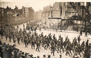 1916 WWI Lille occupied by the German troops, soldiers marching in the city amongst the ruins. photo...