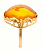 Arany (Au) 14K gyűrű, borostyán kővel, jelzett, méret: 58, bruttó: 6,2 g