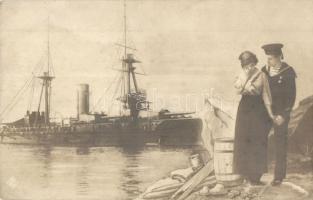 Marine couple with Austro-Hungarian battleship in the background (EK)