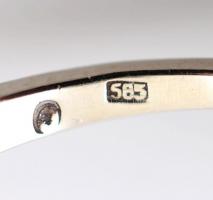 Fehér arany (14 K) gyűrű táblás csiszolású smaragd kővel, körülötte 30 db csiszolt brill kővel (d:30...