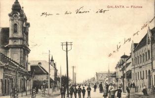 Galánta, Fő utca, templom, üzletek / main street with church, shops