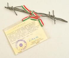 1989 Szögesdrót darab az osztrák-magyar határon húzódó vasfüggönyből, igazolással, 20×4,5 cm / Piece of barbed wire from the Iron Curtain, with certification, 20×4,5 cm