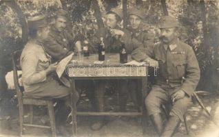 1916 Osztrák-magyar tisztek asztaltársasága, a képen pipázó katona írta a levelezőlapot. A Regimentsfotográfus felvétele az árvák javára / WWI Austro-Hungarian K.u.K. officers by the table. photo (EK)