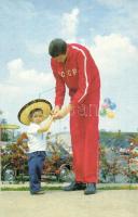 Sergei Kovalenko, Soviet basketball player, who won the gold medal with the Soviet basketball team in the 1972 Olympics in Munich. Kovalenko giving an autograph to a boy.