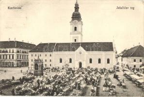Károlyváros, Karlovac; Jelacicev trg / Jelacic tér, piaci árusok, templom. L. Reich kiadása / square, market vendors, church (EK)