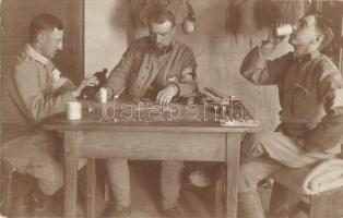 1915 Osztrák-magyar szanitécek dominó játéka az asztalnál, bor és édesség mellett / WWI Austro-Hungarian K.u.K. medics play domino by the table, eating desserts and drinking wine. photo (apró szakadás / tiny tear)