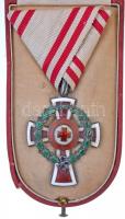 1914. A Vörös Kereszt II. Osztályú Díszjelvénye hadidíszítménnyel Ag, zománcozott kitüntetés mellszalagon, eredeti BACHBUCH A. tokban T:2- a babérkoszorú hajlott, a medalion hátoldala hiányzik, tok alsó felén sérülés Hungary 1914. Red Cross, Badge of Honour, 2nd Class, with a war decoration Ag decoration on ribbon, in original BACHBUCH A. case C:VF the wreath is bent, reverse of the medalion is missing, lower part of the case is damaged NMK 283.