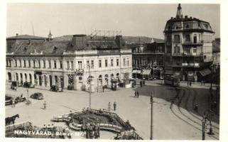 Nagyvárad, Oradea; Bémer tér, villamosok, autómobilok, drogéria, Magyar Általános Hitelbank fiókja, Fazekas és Vadas üzlete, magyar katonák / square, automobiles, pharmacy, shops, tram, bank, Hungarian soldiers. photo