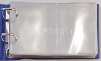 2db kisméretű, műbőr éremtartó album egyenként 100 férőhellyel. Szép állapotban. Néhány oldal haszná...