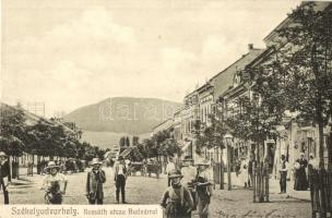 Székelyudvarhely, Odorheiu Secuiesc; Kossuth utca, Budvár / street view with castle