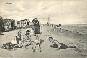 Grado, bathing people at the beach, man doing push-ups. G. Stockel & Debarba (EK)