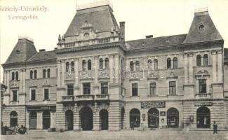 Székelyudvarhely, Odorheiu Secuiesc; vármegyeház, Dénes R., Darszon Béla lámpa raktár és Székely fodrász üzlete. Székely Dénes kiadása / county hall, shops (nyomdai elcsúszás / typographically slipped text)