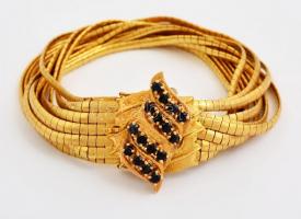 Több soros 18K arany karlánc. Jelzett, bőr tokkal.  / 18 C massive gold bracelet with leather case 7...