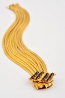 Több soros 18K arany karlánc. Jelzett, bőr tokkal.  / 18 C massive gold bracelet with leather case 7...