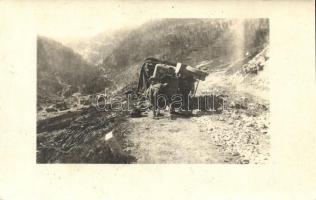 1918 Kilőtt teherkocsi / WWI Austro-Hungarian K.u.K. soldier by a destroyed freight car. photo (EK)