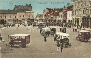 Kolozsvár, Cluj; Egyesülési tér autóbuszokkal, L. Reményik és Albina üzlete / Piata Unirii / square with autobuses, shops