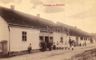 Okucani, utcakép M. Majstorovic üzletével. W.L. 927. / street view with shop (vágott / cut)