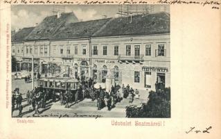 Szatmárnémeti, Szatmár, Satu Mare; Deák tér, Frankó János, Kerekes Zs., Győri Károly üzletei, Szatmári Asztalosok bútortelepe, étterem, villamos, tömeg. Löwy Miksa kiadása / square, shops, carpenters' furniture workshop, restaurant, tram, crowd (r)