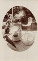 Mother with her baby in baby carriage. photo