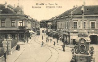 Újvidék, Novi Sad; Duna utca, villamos, üzletek / street view with tram and shops