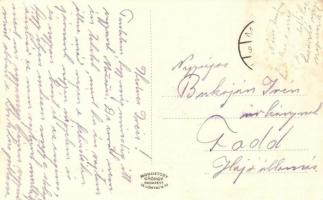 Mözs, utcakép üzlettel és kerékpárossal, római katolikus templom  (Rb)