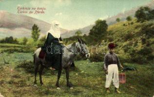 Turkinja na konju / Türkin zu Pferde / Turkish woman on horseback, folklore, traditional costume. W. L. Bp. 1910. No. 21. (EK)