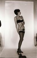 cca 1972 Kilenc modell egy-egy pillanata, 9 db szolidan erotikus felvétel negatívja, 24x36 mm