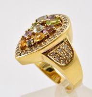 Ezüst(Ag) gyűrű szintetikus kövekkel, jelzett, méret: 65, bruttó: 14,2 g