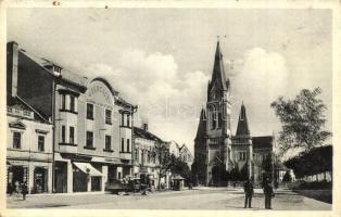 Munkács, Mukacheve, Mukacevo; Masaryk utca, Római katolikus templom, Dr. Ferenczy gyógyszertár, teherautó, üzletek / Masaryková ulice, Rim. kat. kostel, Lékárna / street view, church, pharmacy, truck, shops + 1938 Munkács visszatért So. Stpl. (fl)