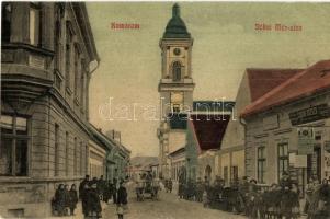 Komárom, Komárno; Jókai Mór utca, Girch József üzlete, gyerekek, templom. L. H. Pannonia / street vi...