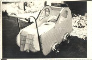 1949 Child in baby carriage. photo