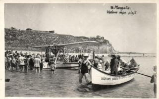 Mangalia, Vedere depe plaja / Hydroplane, boat with the advertisement of Bodega Restaurant. photo