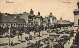 Debrecen, Piac utca, villamos és hirdetőoszlop Lantos csipkeáruházának reklámjával, Debreczen szálloda