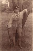 Levente kisfiú puskával / Boy of the "Levente" Hungarian paramilitary youth organization with gun. photo