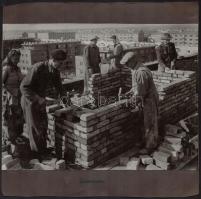 cca 1960-1970 Sztálinváros, Építkezések, 2 db albumlapra ragasztott fotó, 18x24 cm
